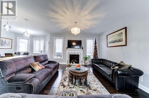 16 Walnut Drive, Wasaga Beach, ON - Indoor Photo Showing Living Room With Fireplace