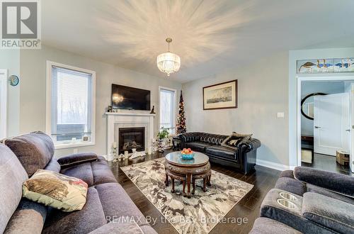 16 Walnut Drive, Wasaga Beach, ON - Indoor Photo Showing Living Room With Fireplace