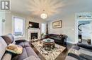 16 Walnut Drive, Wasaga Beach, ON  - Indoor Photo Showing Living Room With Fireplace 