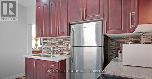 Upper - 92 Nelson Street W, Brampton, ON - Indoor Photo Showing Kitchen With Double Sink