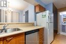 Th329 - 38 Lee Centre Drive, Toronto, ON  - Indoor Photo Showing Kitchen With Double Sink 