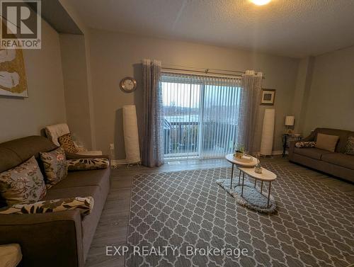 Upper - 702 Sauve Street, Milton, ON - Indoor Photo Showing Living Room