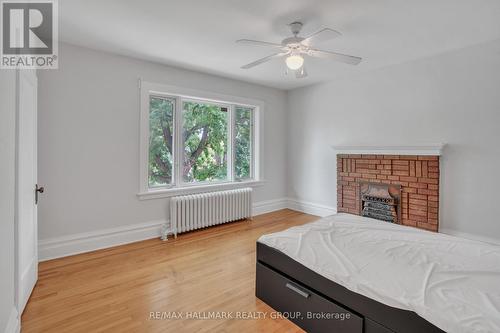 118 Queen Elizabeth Drive, Ottawa, ON - Indoor Photo Showing Bedroom With Fireplace