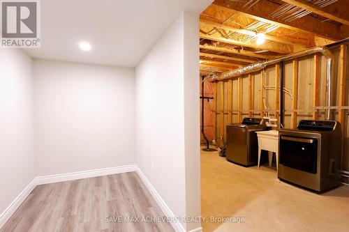 403 - 9861 Glendon Drive, Middlesex Centre, ON - Indoor Photo Showing Basement