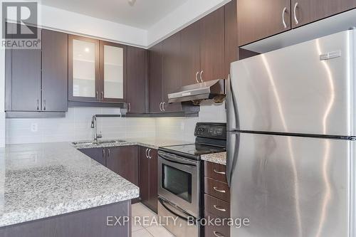 307 - 57 Upper Duke Crescent, Markham, ON - Indoor Photo Showing Kitchen With Upgraded Kitchen