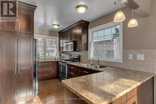 995 Pembridge Crescent, Kingston (North Of Taylor-Kidd Blvd), ON - Indoor Photo Showing Kitchen With Double Sink