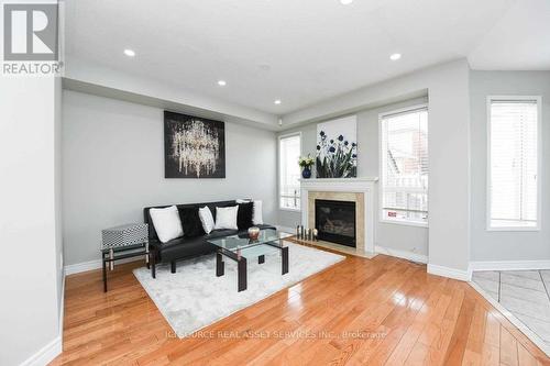 Upper - 11 Penbridge Circle, Brampton, ON - Indoor Photo Showing Living Room With Fireplace