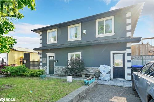 View of front facade featuring a front lawn - 8876 County Road 56, Utopia, ON 