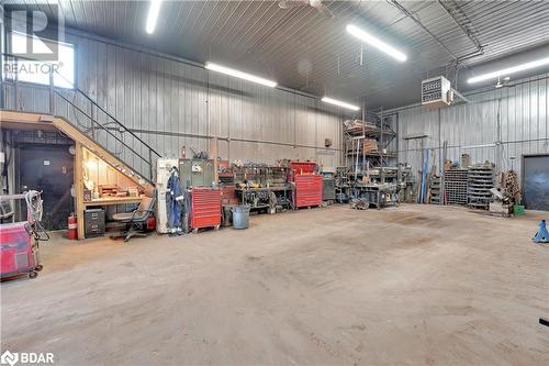 Garage featuring a workshop area - 8876 County Road 56, Utopia, ON 