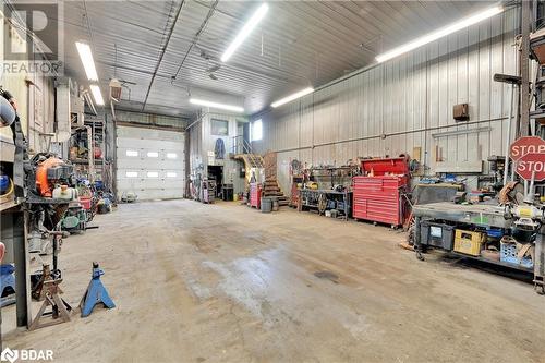 Garage featuring a workshop area - 8876 County Road 56, Utopia, ON 