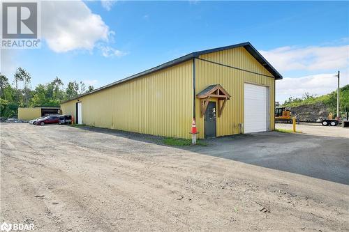 View of outbuilding with a garage - 8876 County Road 56, Utopia, ON 