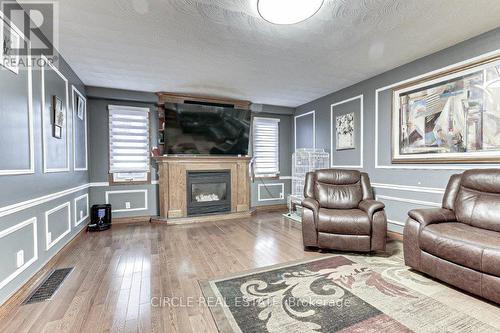 350 Lansdowne Avenue, Woodstock, ON - Indoor Photo Showing Living Room With Fireplace