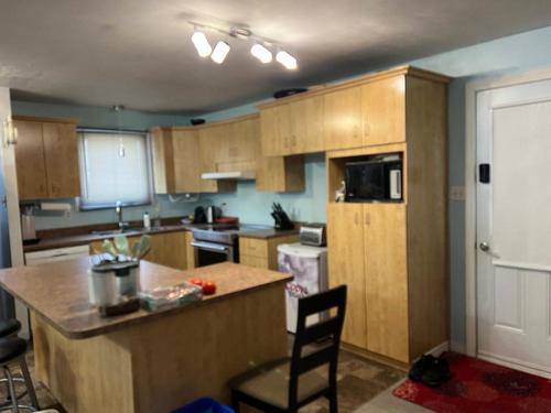 Kitchen - 509A  - 509B 2E Rue, Chibougamau, QC - Indoor Photo Showing Kitchen With Double Sink