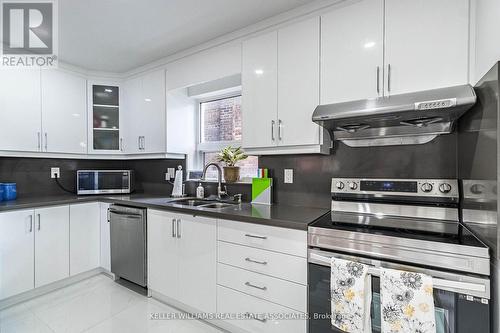 25 Boustead Avenue, Toronto, ON - Indoor Photo Showing Kitchen With Stainless Steel Kitchen With Double Sink