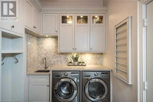 Main floor mud room/ laundry. - 304 Mcgibbon Drive, Milton, ON - Indoor Photo Showing Laundry Room