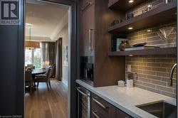 Walk-in pantry & pass through servery. - 