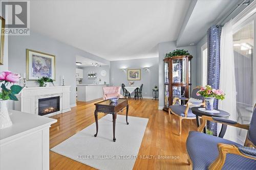 A - 1105 Stittsville Main Street, Ottawa, ON - Indoor Photo Showing Living Room With Fireplace