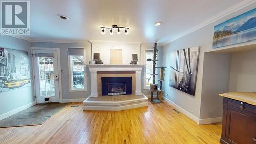 10603 104 Street, Fort St. John, BC - Indoor Photo Showing Living Room With Fireplace