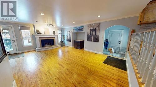 10603 104 Street, Fort St. John, BC - Indoor Photo Showing Living Room With Fireplace