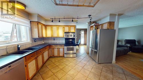 10603 104 Street, Fort St. John, BC - Indoor Photo Showing Kitchen With Double Sink