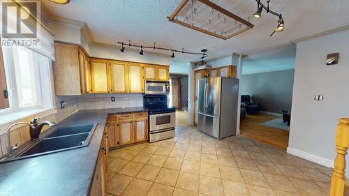 10603 104 Street, Fort St. John, BC - Indoor Photo Showing Kitchen With Double Sink