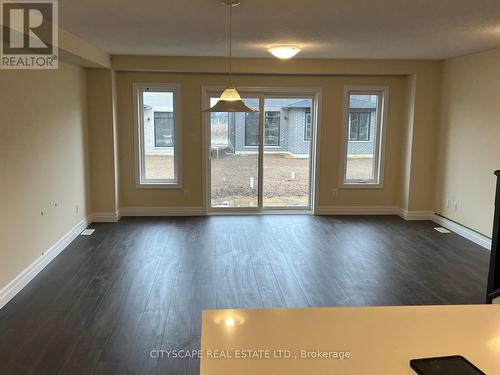 52 Wilkinson Avenue, Cambridge, ON - Indoor Photo Showing Other Room With Fireplace