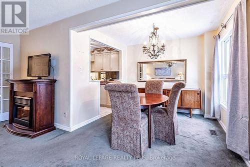 62 - 3351 Hornbeam Crescent, Mississauga, ON - Indoor Photo Showing Dining Room With Fireplace