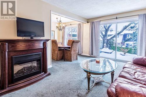 62 - 3351 Hornbeam Crescent, Mississauga, ON - Indoor Photo Showing Living Room With Fireplace