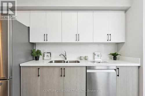 910 - 51 Times Avenue, Markham, ON - Indoor Photo Showing Kitchen With Double Sink