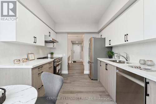 910 - 51 Times Avenue, Markham, ON - Indoor Photo Showing Kitchen With Double Sink