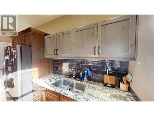 208 15Th Avenue S, Cranbrook, BC - Indoor Photo Showing Kitchen With Double Sink