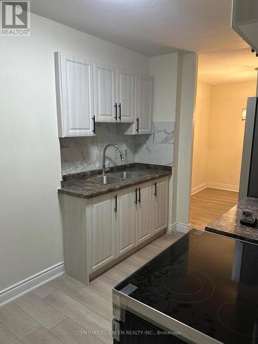 908 - 2645 Kipling Avenue, Toronto, ON - Indoor Photo Showing Kitchen With Double Sink