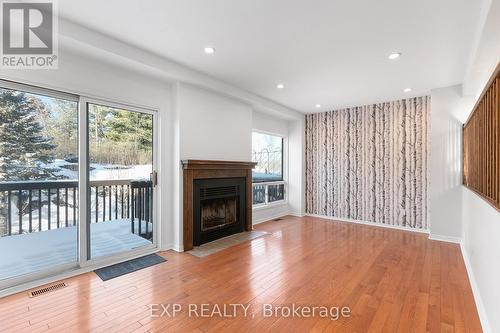 313 Knudson Drive, Ottawa, ON - Indoor Photo Showing Living Room With Fireplace