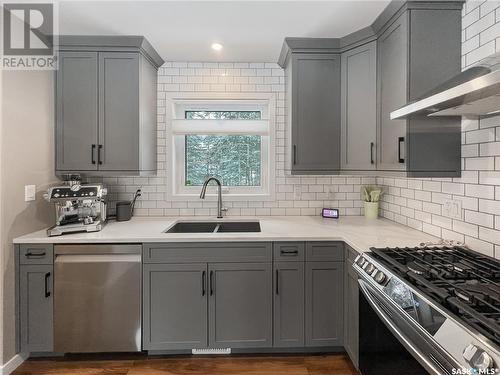 306 Meadow Ridge Drive, Candle Lake, SK - Indoor Photo Showing Kitchen With Double Sink With Upgraded Kitchen