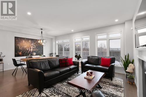 617 Sora Way, Ottawa, ON - Indoor Photo Showing Living Room With Fireplace