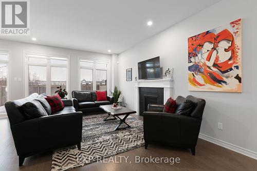 617 Sora Way, Ottawa, ON - Indoor Photo Showing Living Room With Fireplace