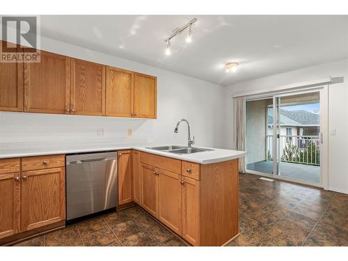 153 Snowsell Street Unit# 1, Kelowna, BC - Indoor Photo Showing Kitchen With Double Sink