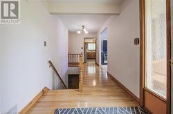 hallway leading to living room and kitchen - 