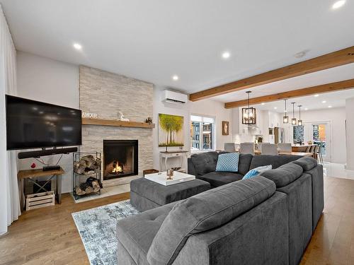 Salon - 592 Rue Charlie-Forbell, Mont-Tremblant, QC - Indoor Photo Showing Living Room With Fireplace