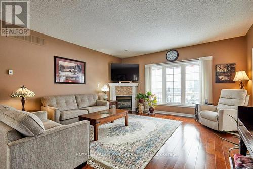 134 Southcrest Drive, Kawartha Lakes, ON - Indoor Photo Showing Living Room With Fireplace