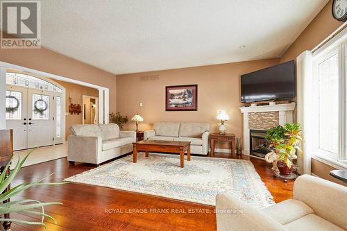 134 Southcrest Drive, Kawartha Lakes, ON - Indoor Photo Showing Living Room With Fireplace