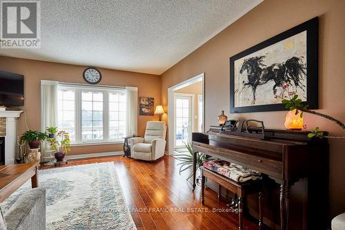 134 Southcrest Drive, Kawartha Lakes, ON - Indoor Photo Showing Living Room With Fireplace