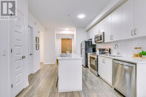 223 - 1105 Leger Way, Milton, ON - Indoor Photo Showing Kitchen With Stainless Steel Kitchen With Double Sink