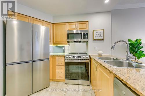 101 - 40 Old Mill Road, Oakville, ON - Indoor Photo Showing Kitchen With Double Sink