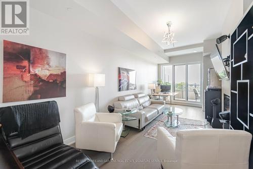 312 - 20 Shore Breeze Drive, Toronto, ON - Indoor Photo Showing Living Room