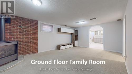 19 Radford Drive, Brampton, ON - Indoor Photo Showing Other Room With Fireplace