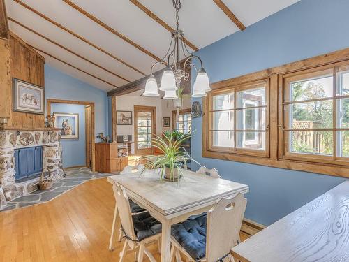 Salle Ã  manger - 8950  - 8952 Ch. Bourgeois, Mirabel, QC - Indoor Photo Showing Dining Room With Fireplace