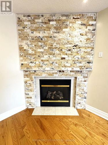 Upper - 7276 Bread Fruit Lane, Mississauga, ON - Indoor Photo Showing Living Room With Fireplace