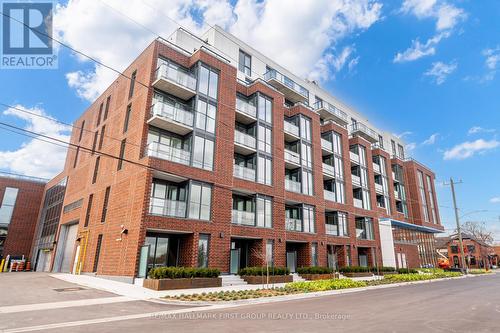 404 - 201 Brock Street S, Whitby, ON - Outdoor With Balcony With Facade