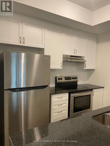 607 - 1034 Reflection Place, Pickering, ON - Indoor Photo Showing Kitchen With Stainless Steel Kitchen